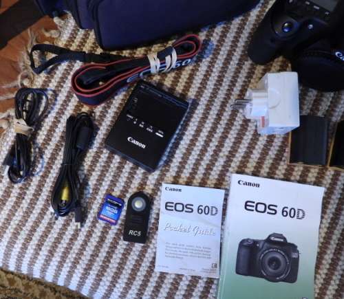 Canon 60D body only with accesories shown in Photo, has some minor signs of ues, good condition,