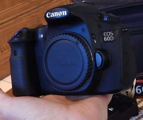 Canon 60D body only with accesories shown in Photo, has some minor signs of ues, good condition,