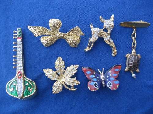 Six Gold Gold Coloured Costume Jewellery Brooches