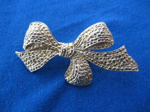 Six Gold Gold Coloured Costume Jewellery Brooches