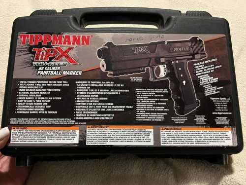 Tippmann TipX True-Feed .68 Caliber Gas, Pepper and Paintball Gun complete with additionals