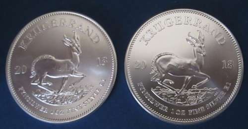 ( LOW START )...TWO .2018 1oz PURE SILVER.. KRUGERRANDS....ONE BID FOR BOTH
