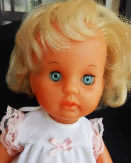 collectable vintage First Love doll in very good condition and original dress