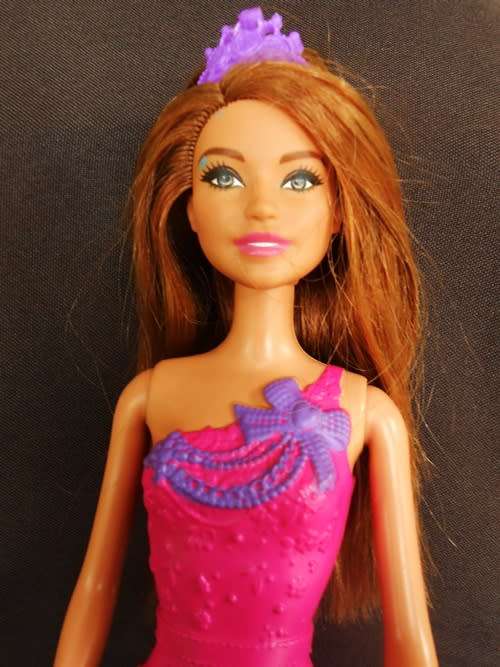 Barbie Princess Doll with brown hair and dress in fuchsia