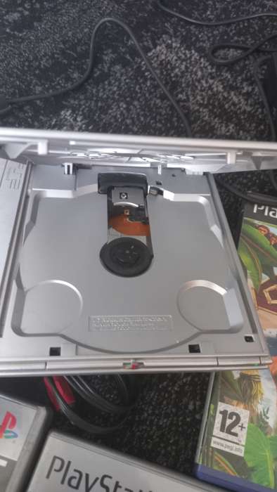 PS2 console with 8 games and 8mb card