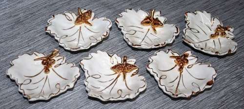 SIX STYLISH PORCELAIN BONE DISHES BEAUTIFULLY DECORATED WITH A GOLD TRIM!!