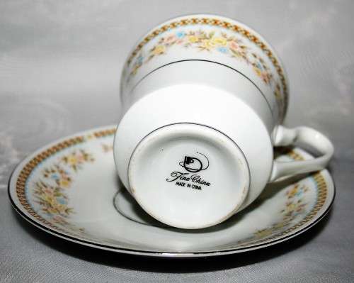SIX STYLISH PORCELAIN DIO SETS BEAUTIFULLY DECORATED WITH A FLORAL PATERN TEA ON THE PATIO BID  P/EA