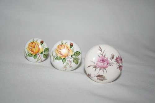 Three gorgeous Porcelain with flowers drawer Knobs.  These are full of cottage chic! Pretty flowers