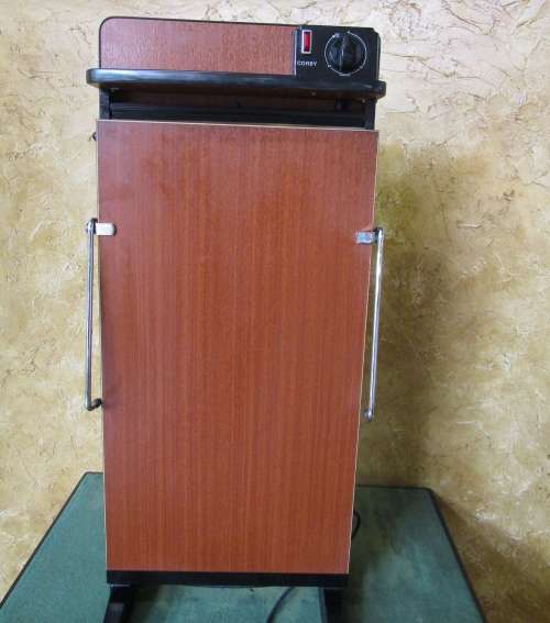 The Corby Trouser Press.  Thermostatic temperature control, self-adjusting section for turn-ups