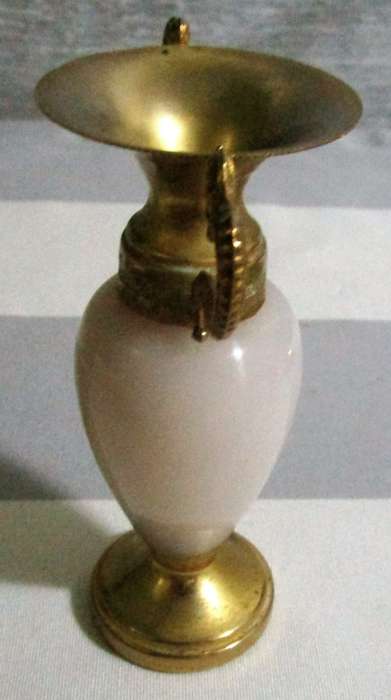 Cute urn style Brass bud vase with carved onyx accent. The onxy grain is white in color