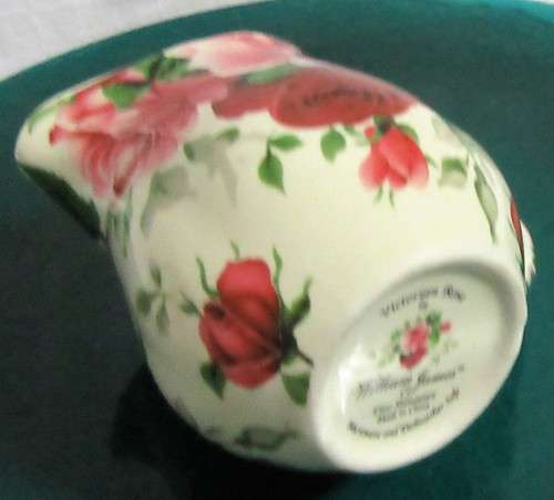 A STUNNING FLORAL VICTORIAN ROSE MILK CREAMER BY WILLIAM JAMES -