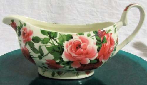 A STUNNING FLORAL VICTORIAN ROSE SAUCE BOAT BY WILLIAM JAMES -