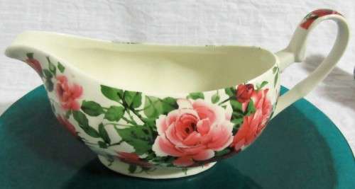 A STUNNING FLORAL VICTORIAN ROSE SAUCE BOAT BY WILLIAM JAMES -