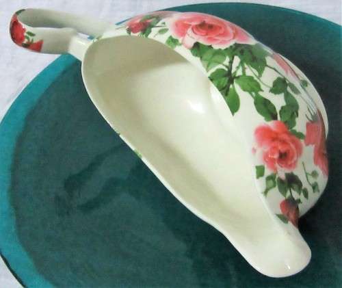 A STUNNING FLORAL VICTORIAN ROSE SAUCE BOAT BY WILLIAM JAMES -