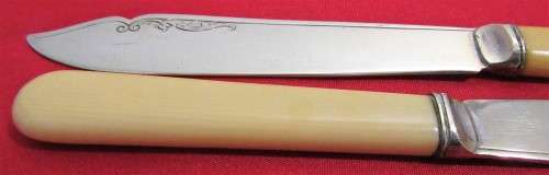 This is a vintage set of 4  English bone handled and silver plated knifes. Hallmarked EPNSA