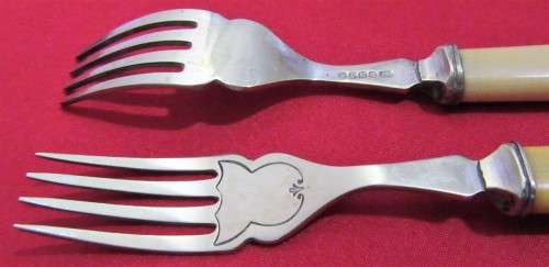 This is a vintage set of 6  English bone handled and silver plated forks. Hallmarked EPNSA