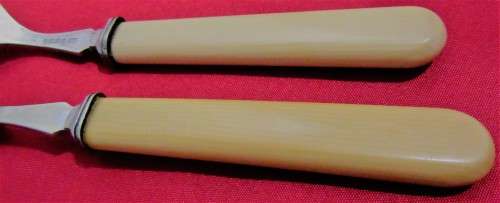 This is a vintage set of 6  English bone handled and silver plated forks. Hallmarked EPNSA