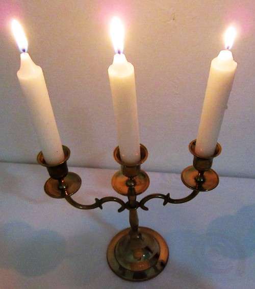 WOW A ELGANT VINTAGE THREE TIER BRASS CANDLE HOLDER TO SET THE MOOD ON THE DINNER TABLE