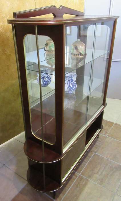 A VERY DIFFERENT IMBUIA BALL & CALW GLASS CABINET WITH A MIRROR AT THE BACK FINISHED OF WITH BRASS