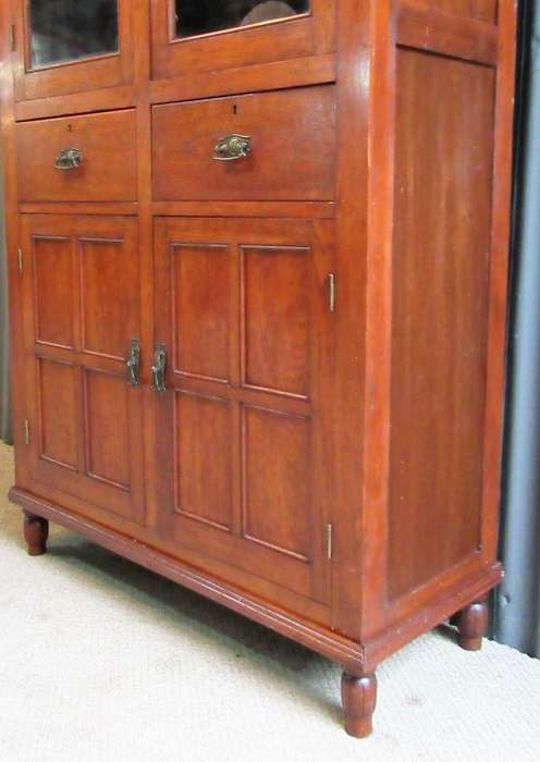 WOW BEEN TOLD THIS IS A ANTIQUE DRS CUPBOARD IT IS REAL SHOW STOPPER FINISHED IN BURMESE TEAK