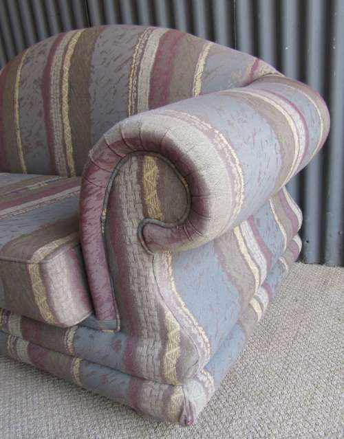 A VERY COMFORTABLE 2 SEATER SOFA FABRIC IS FAIR ONE OR TWO SCUFS - OR FOR RECOVERY