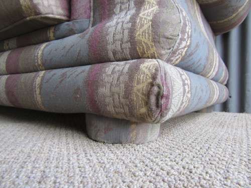 A VERY COMFORTABLE 2 SEATER SOFA FABRIC IS FAIR ONE OR TWO SCUFS - OR FOR RECOVERY