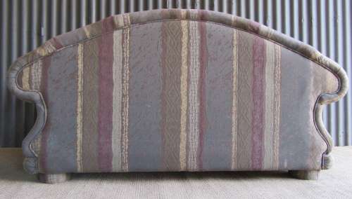 A VERY COMFORTABLE 2 SEATER SOFA FABRIC IS FAIR ONE OR TWO SCUFS - OR FOR RECOVERY