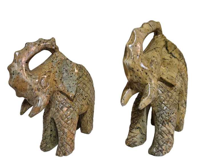 Pair of heavy hand-carved stone elephants