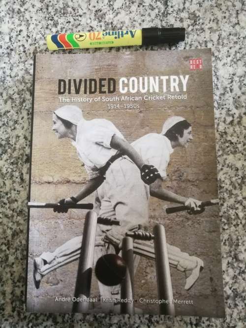 DIVIDED COUNTRY The History of South African Cricket Retold 1914 - 1950`s ANDRE ODENDAAL and others