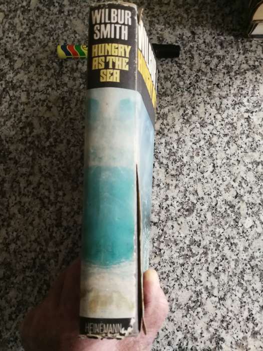WILBUR SMITH HUNGRY AS THE SEA HEINEMAN 1978 Reprint  Edition
