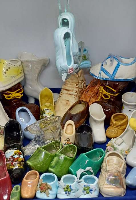Collection of porcelain , pottery glass shoes