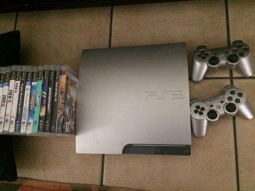 *Rare* Silver PS3 320GB with 13 Games, 2 Controllers and Remote