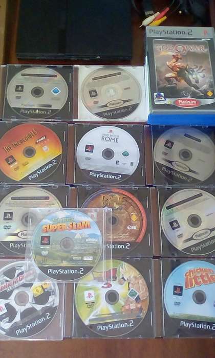 PlayStation 2 Console + Dance Mat + 1 Controller + Power Cable + RCA Cable + 16 Games