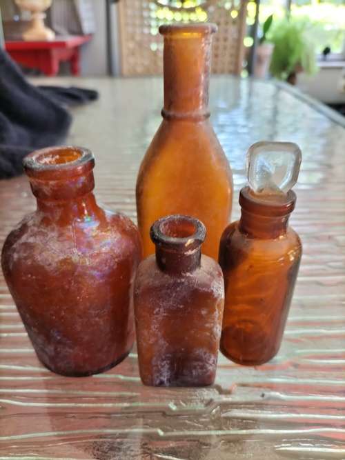 Group of Amber Athrocopy  Bottles