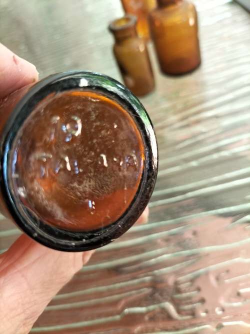Group of Amber Athrocopy  Bottles