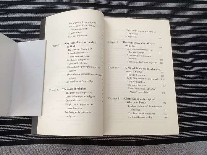 The GOD Delusion, by Richard Dawkins, Large format Paperback in a Fine Condition.