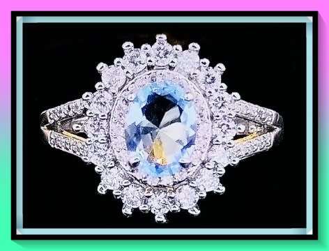 Lovely simulated topaz princess design ring size: 8