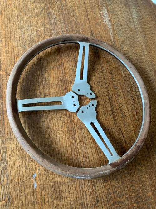 Vintage sports car aluminium and wood steering wheel