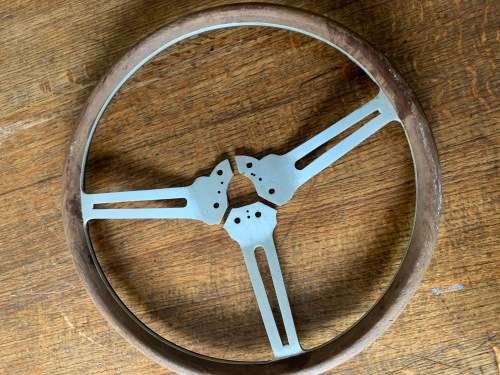 Vintage sports car aluminium and wood steering wheel