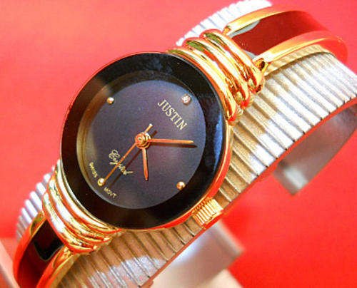 - LADIES METAL WATCH-GOLD TONED and BLACK***EXCELLENT SMALL WATCH