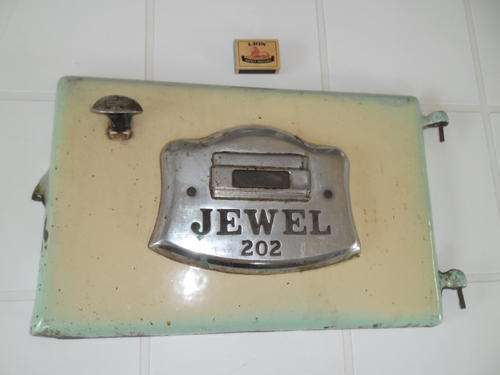 old Jewel 202 cast iron enamel front oven door weighs about 5,5kg
