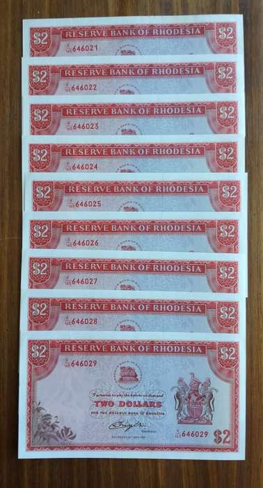 Rhodesia Salisbury 9 consecutive number bird watermark UNC-AUNC two dollar bank notes. Nice collecti