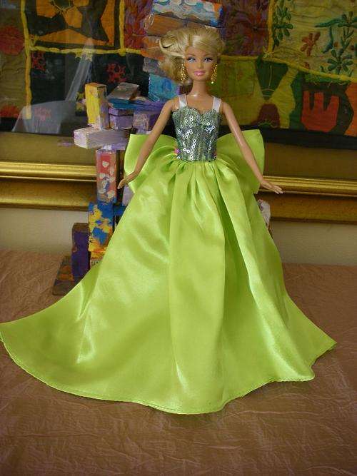 Beautiful green satin Barbie doll dress with large bow and sequenced bodice