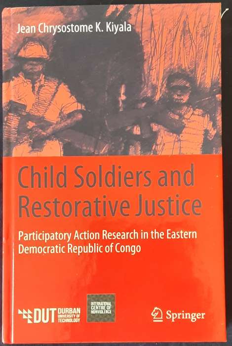 Child Soldiers and Restorative Justice by Jean Chrysostome K Kiyala **Signed Copy **