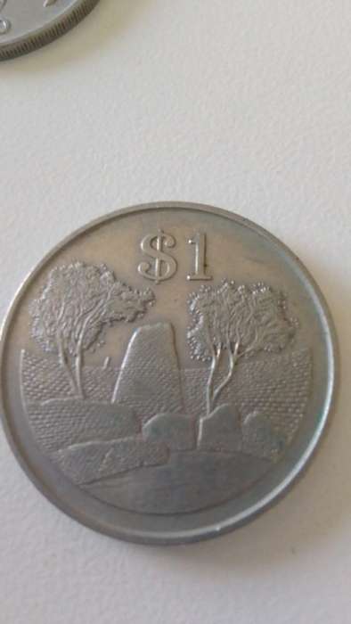 ZIMBABWE 1980 ONE DOLLAR COIN -NICKEL PLATED STEEL (BID PER COIN)