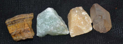 Selection of 4 Rough Healing Stones   CLEAR QUARTZ, TIGERS EYE, PEACH AND GREEN AVENTURINE