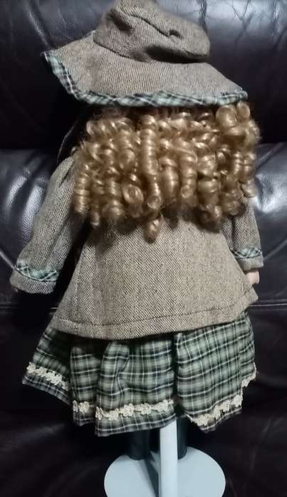 Porcelain Doll with hat