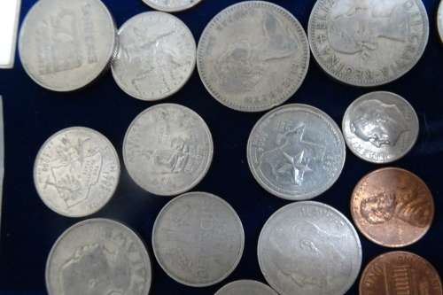 Lot of International Coins and a 1946 Petrol Ration Coupon(Some coins are Silver)
