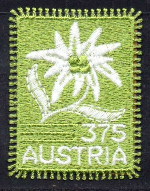 AUSTRIA 2005 VORARLBERG EMBROIDERY EDELWEISS FABRIC STAMP. SG2771. CV GBP 9.75. LOVELY ITEM.