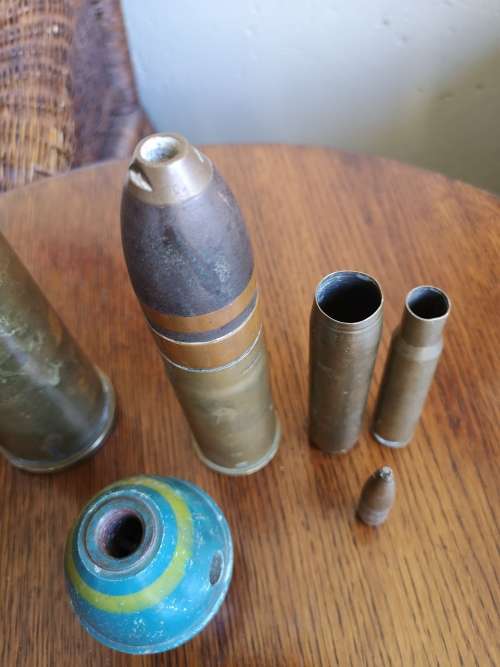 DEACTIVATED MILITARIA SHELLS. AND GRENADE.